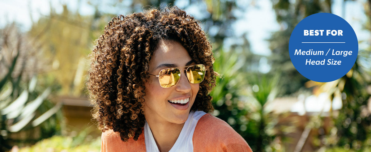 Mount Evans are best for medium to large sized faces. Photo features a woman wearing Mount Evans sunglasses