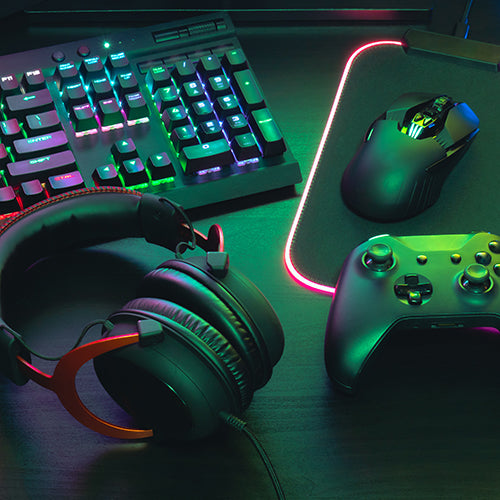 Gamer work space with joystick, keyboard and headset