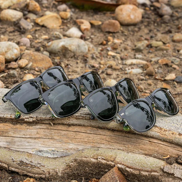 Woman wearing Knockaround Black Moonshine Classics Sunglasses
