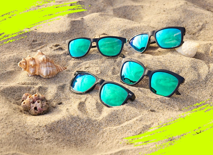 Ibiza sunglasses on a beach