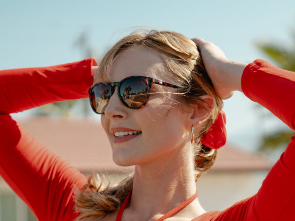 Woman wearing Knockaround sunglasses
