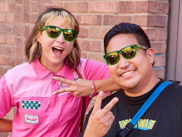 Man and Woman wearing Knockaround TMNT sunglasses
